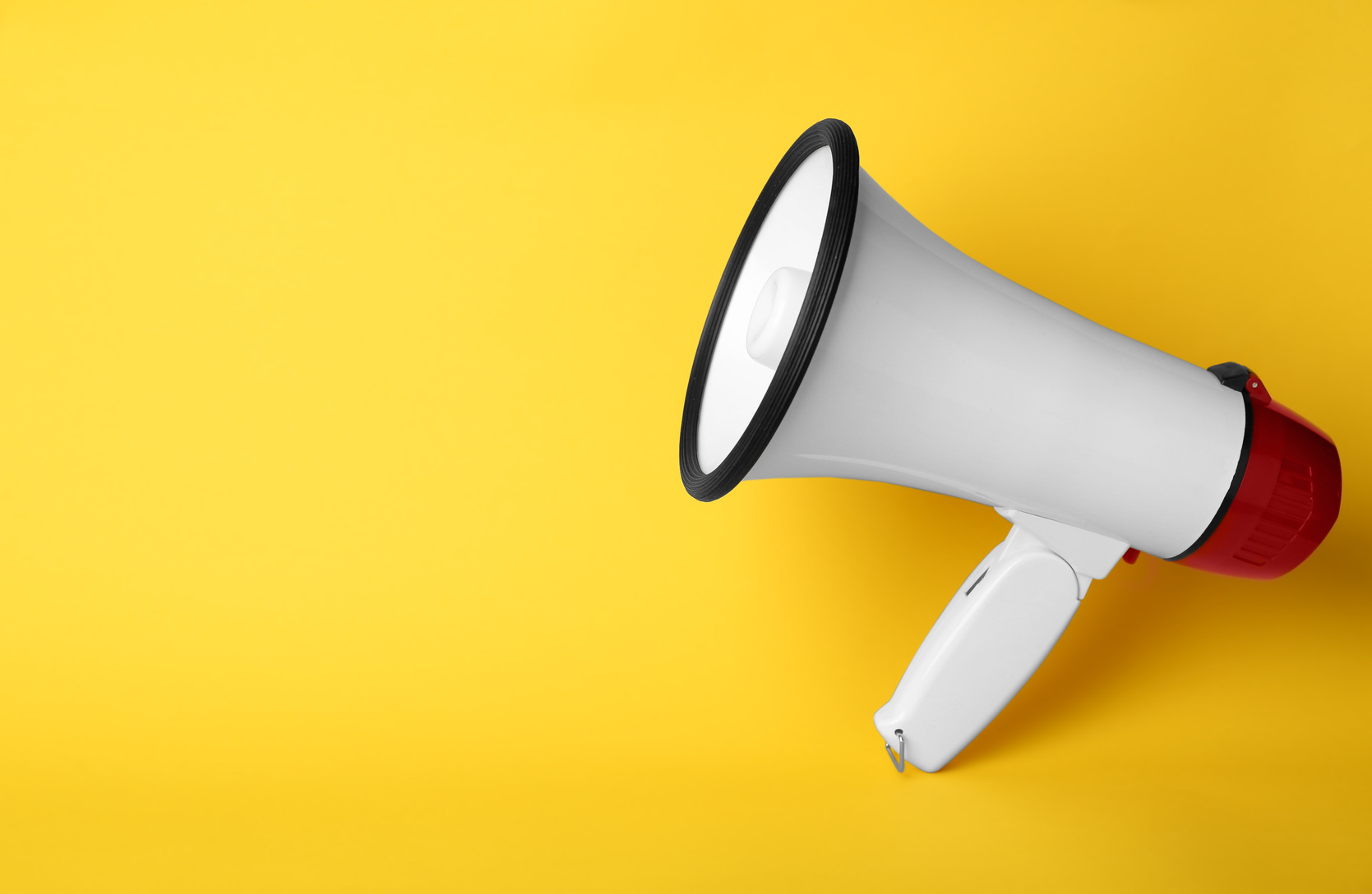 Electronic Megaphone on a Yellow Background